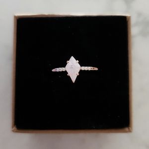 Oomiay Gemandi rose gold plated Ring. Light pink ice crystal and white crystals